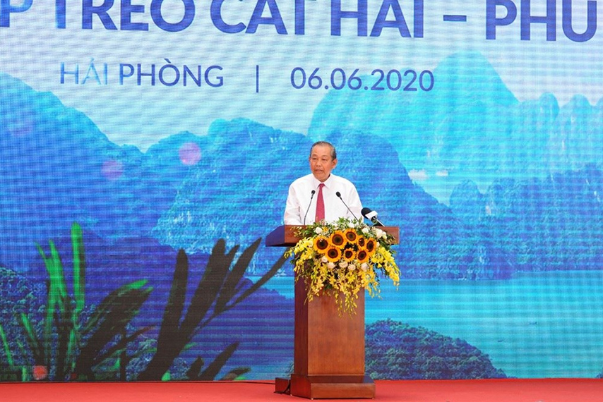 Nguyên Phó Thủ tướng Thường trực Chính phủ Trương Hòa Bình phát biểu tại buổi lễ khai trương tuyến cáp treo Cát Hải - Phù Long 